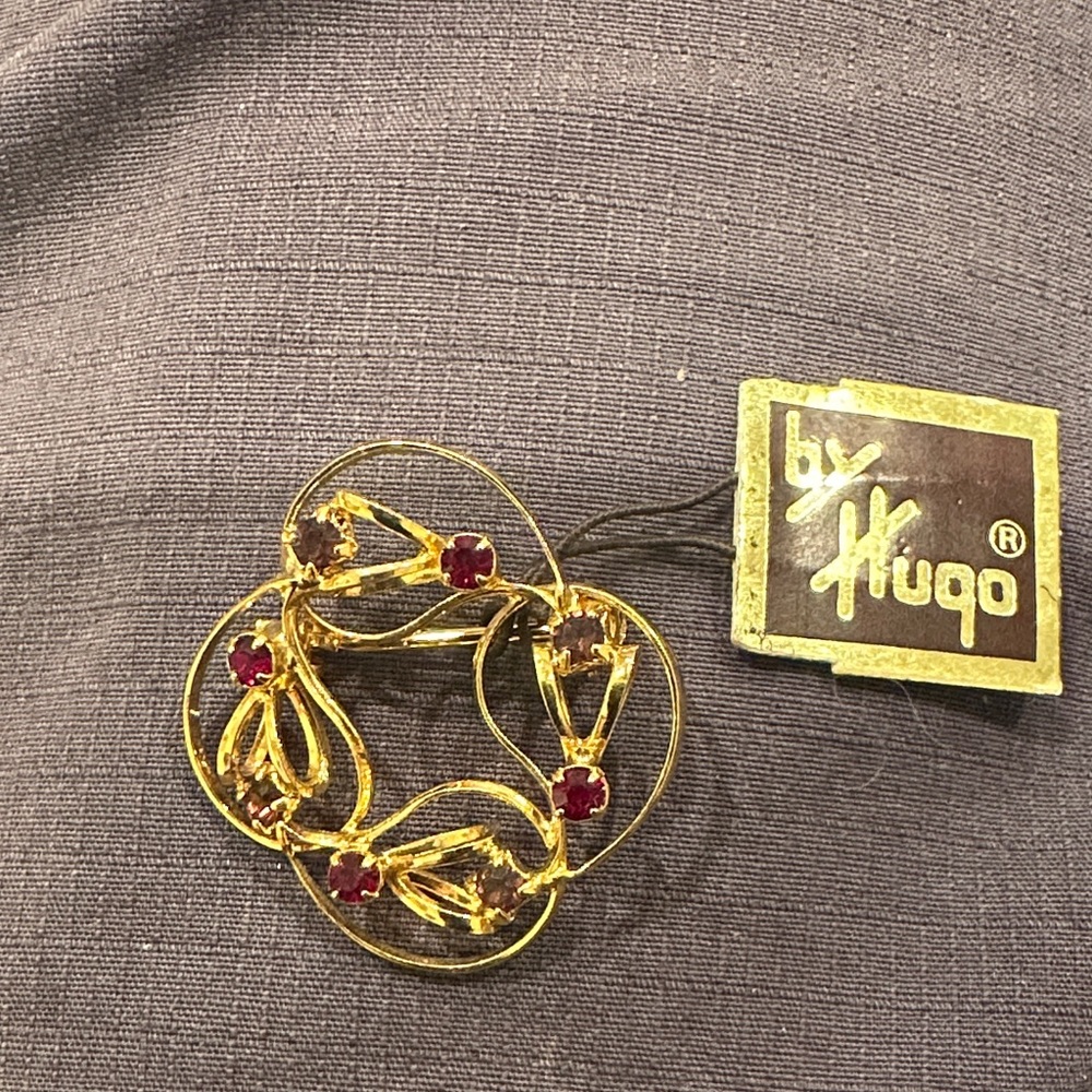 Vintage HUGO Brooch with original tag still attached